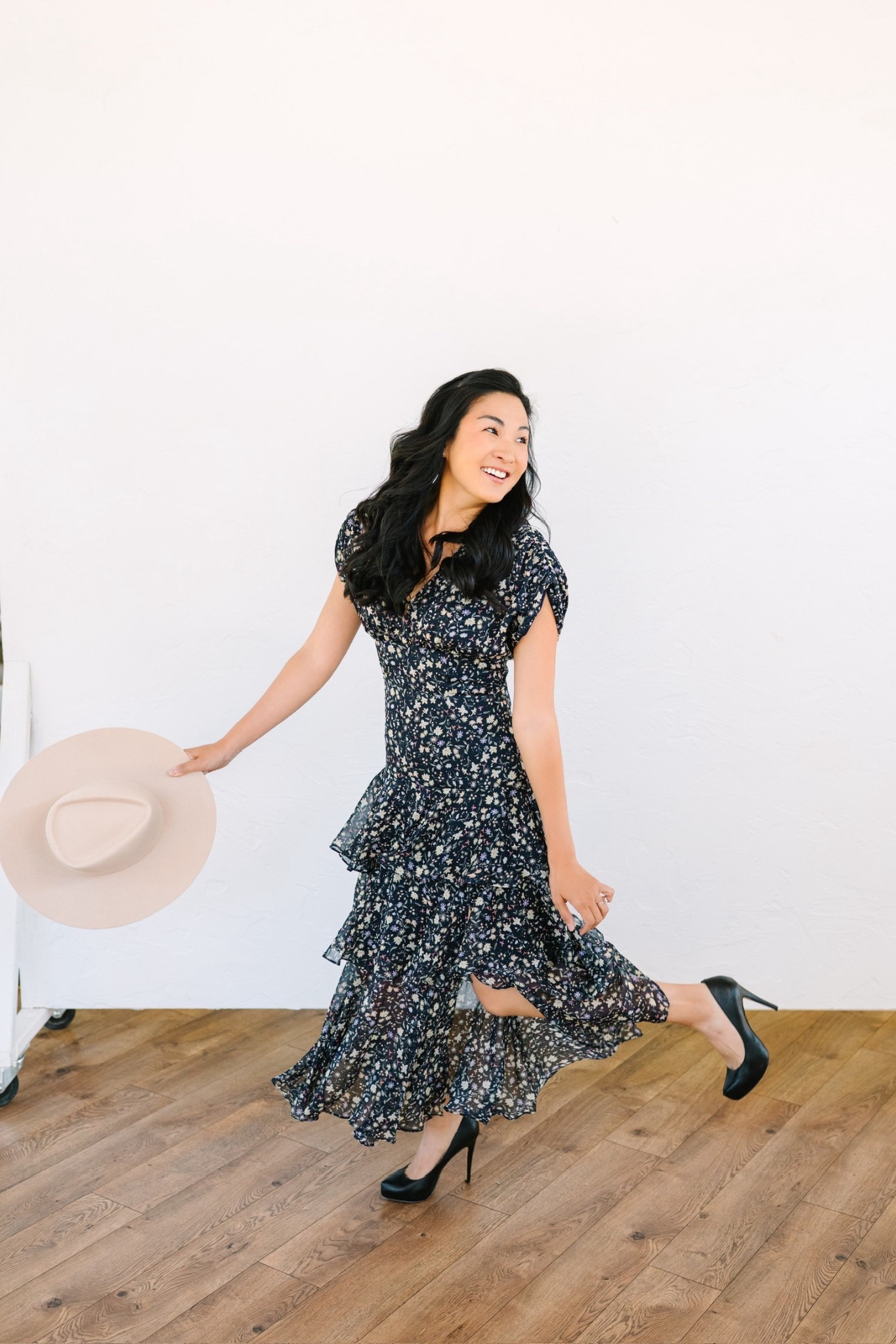 Stepping into summer with florals, ruffles, and a smile 🌸✨ This midi dress is a whole mood—paired with classic black heels and my favorite bucket hat in hand. Effortless, flirty, and perfect for sunny days ahead! 

#LTKShoeCrush #LTKSummerEdit #LTKStyleTip