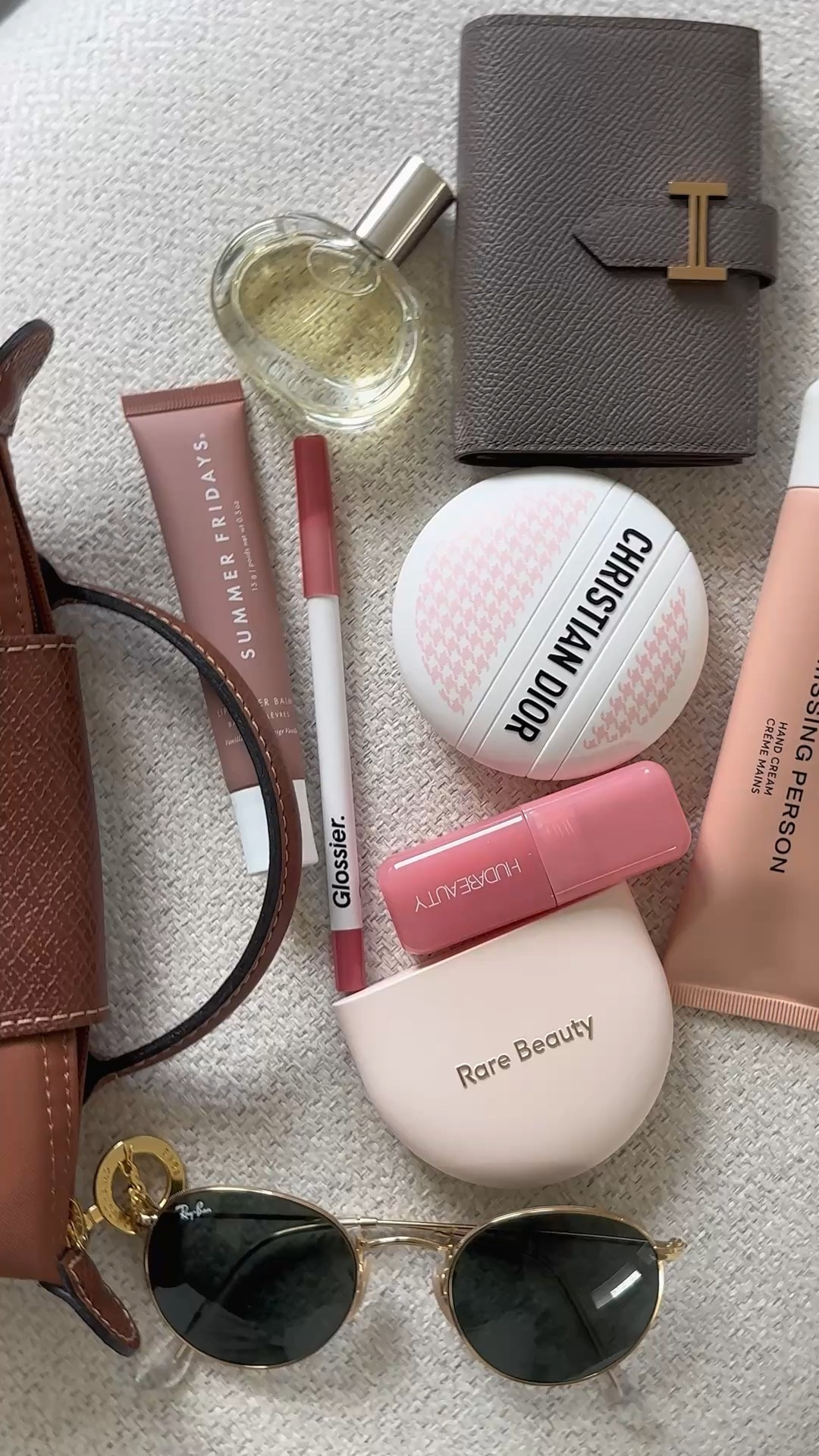 What can fit in my @longchamp Le Pliage Cosmetics Case
@hermes Bearn Card Holder
@rarebeauty True to Myself Tinted Pressed Talc-Free Finishing Powder
@diorbeauty Le Baume
@hermes Barénia Eau de parfum
@phlur Missing Person Hand Cream
@summerfridays Lip Butter Balm
@fentybeauty Gloss Bomb Stix High-Shine Gloss Stick
@glossier Lip Line Enhancing Hydrating Longwear Lip Liner Pencil
@hudabeautyshop Blush Filter Soft Glow Liquid Blush
@rayban  RB3447 Round Metal Sunglasses




#LTKHoliday #LTKBeauty