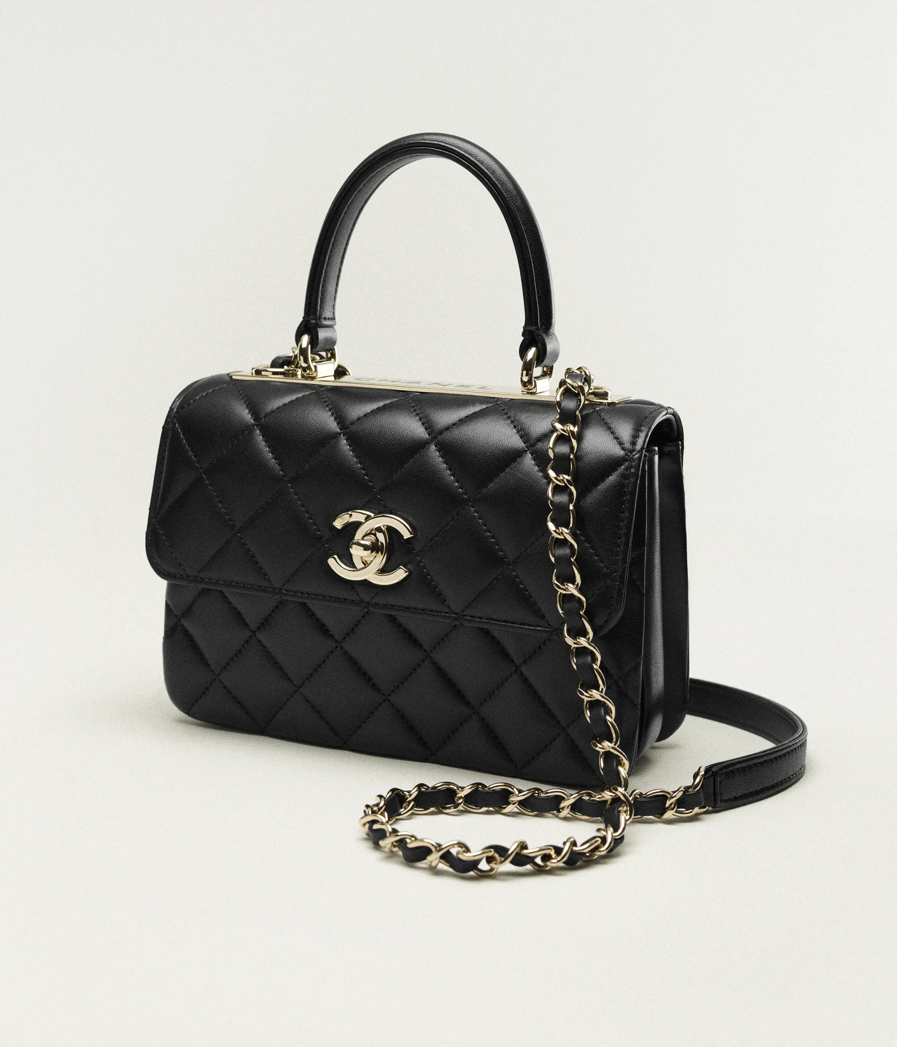 Mini flap bag with top handle, Lambskin & gold-tone metal, black — Fashion | CHANEL | Chanel, Inc. (US)