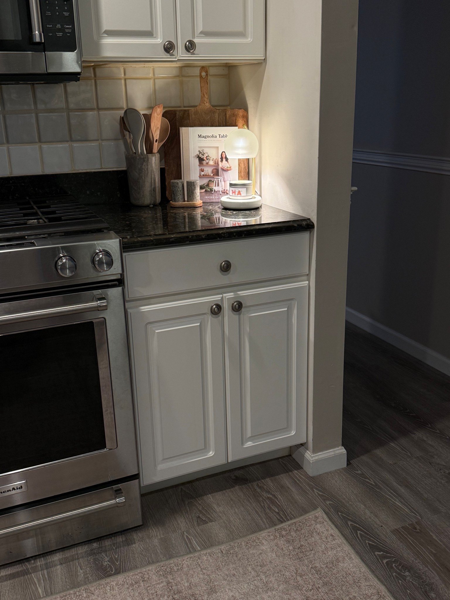 neutral kitchen styling ✨ a cozy corner with soft light, simple details, and a favorite cookbook

#LTKHome #LTKSeasonal #LTKFindsUnder50