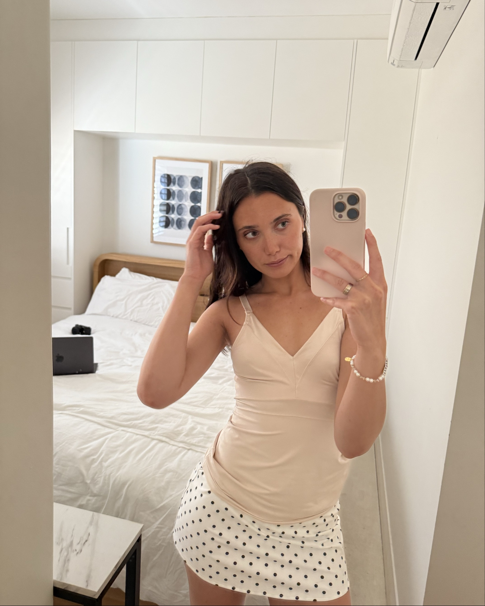 Outfit for a day In Sydney’s harbor! The top is vintage, I’ll link a similar pink tank top! The skirt is my favorite mini skirt from danielle guizio that still covers nice especially since we were walking around! I’ve linked the grey one since they didn’t have any others here, but the polka dot is on their site! The sneakers are from Tory Burch and they go with so much :) 