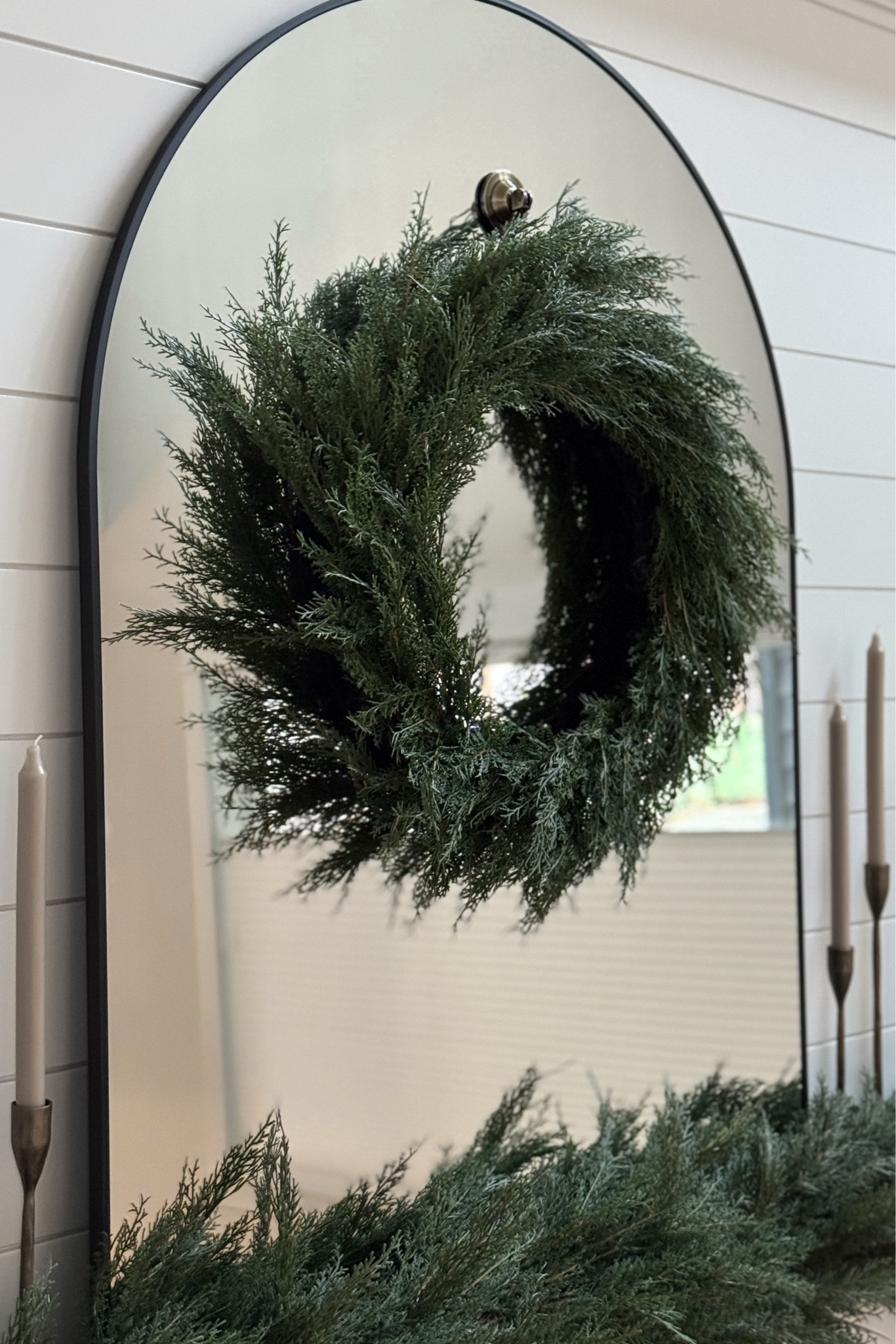 I’ve been so excited to create this scene for the Christmas season as soon as I found the perfect mantle mirror! This glass/mirror hook is amazing and I adore my greenery and candlesticks… it fits our home’s holiday aesthetic perfectly!

#LTKHome #LTKHoliday