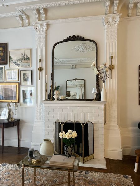 Fireplace decor, mirror, gold wall, sconces, fireplace screen, tulips, vase, Console table

#LTKsalealert #LTKhome #LTKFind