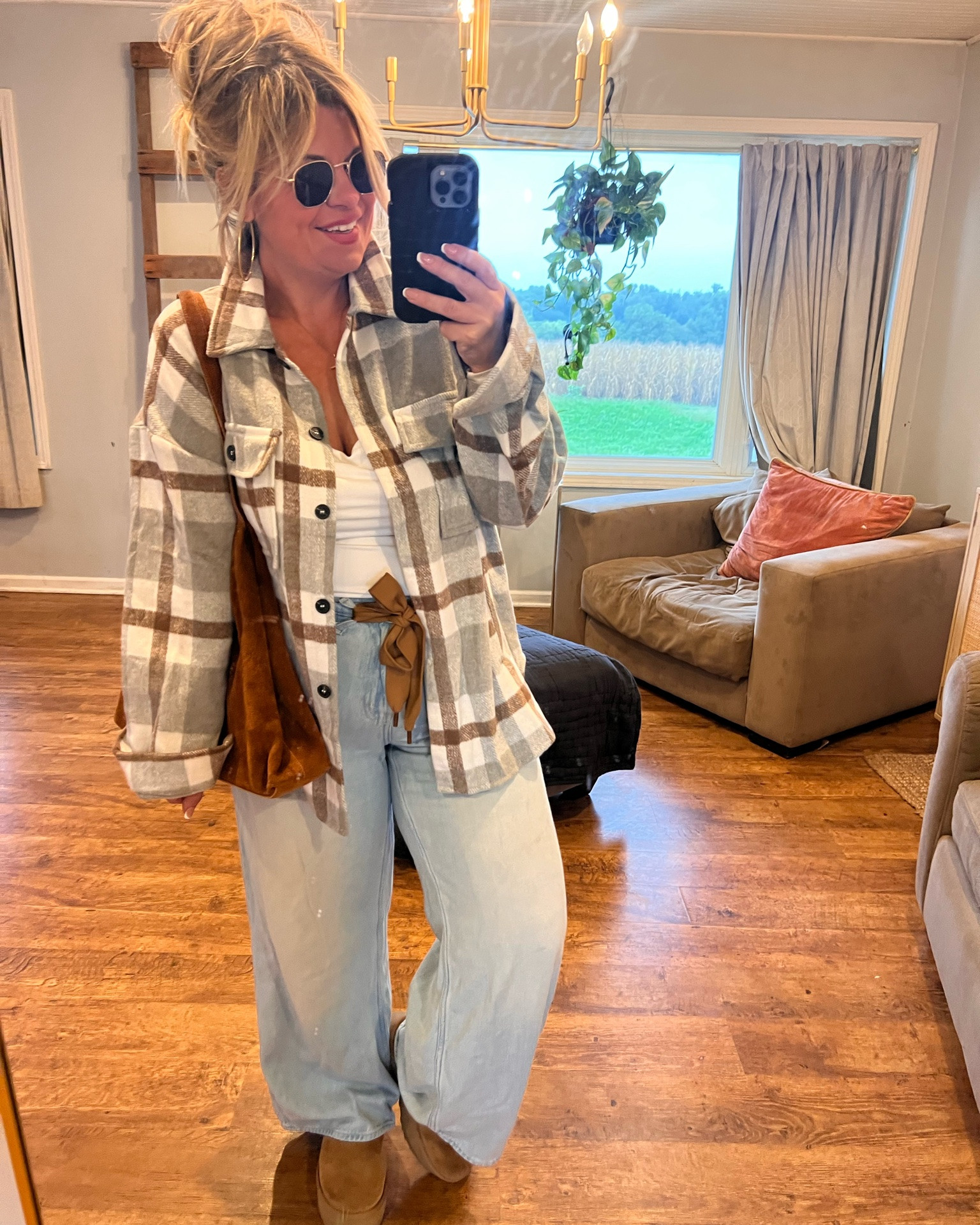 Flannel shackets are one of my favorite layers for styling baggy jeans this fall. 🍂 I love the oversized plaid look paired with wide leg jeans, a simple fitted top, and UGGs for an easy cozy outfit that still looks styled. Perfect for casual fall outfits, everyday mom style, weekend outfits, and layering into winter.
#FlannelShacket #PlaidShacket #FallOutfits #BaggyJeans #WideLegJeans #UGGOutfits #CasualFallOutfits #FallFashion #PlaidJacket #CozyOutfits