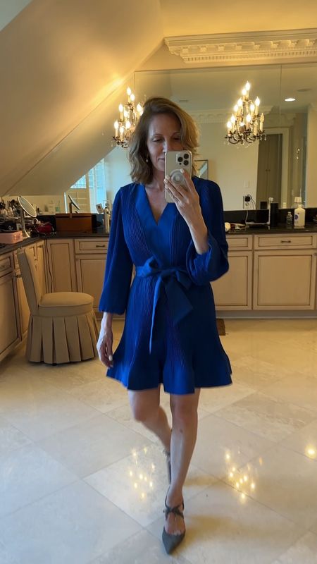 This short pleated dress has a v neckline and elastic at the wrist. It has a beautiful full bow and this color is bright cobalt blue but it is available is so many different colors like pink, orange and gold. Perfect for a wedding guest dress. I am 5’3” and this is a size 0

#LTKFind #LTKsalealert #LTKwedding