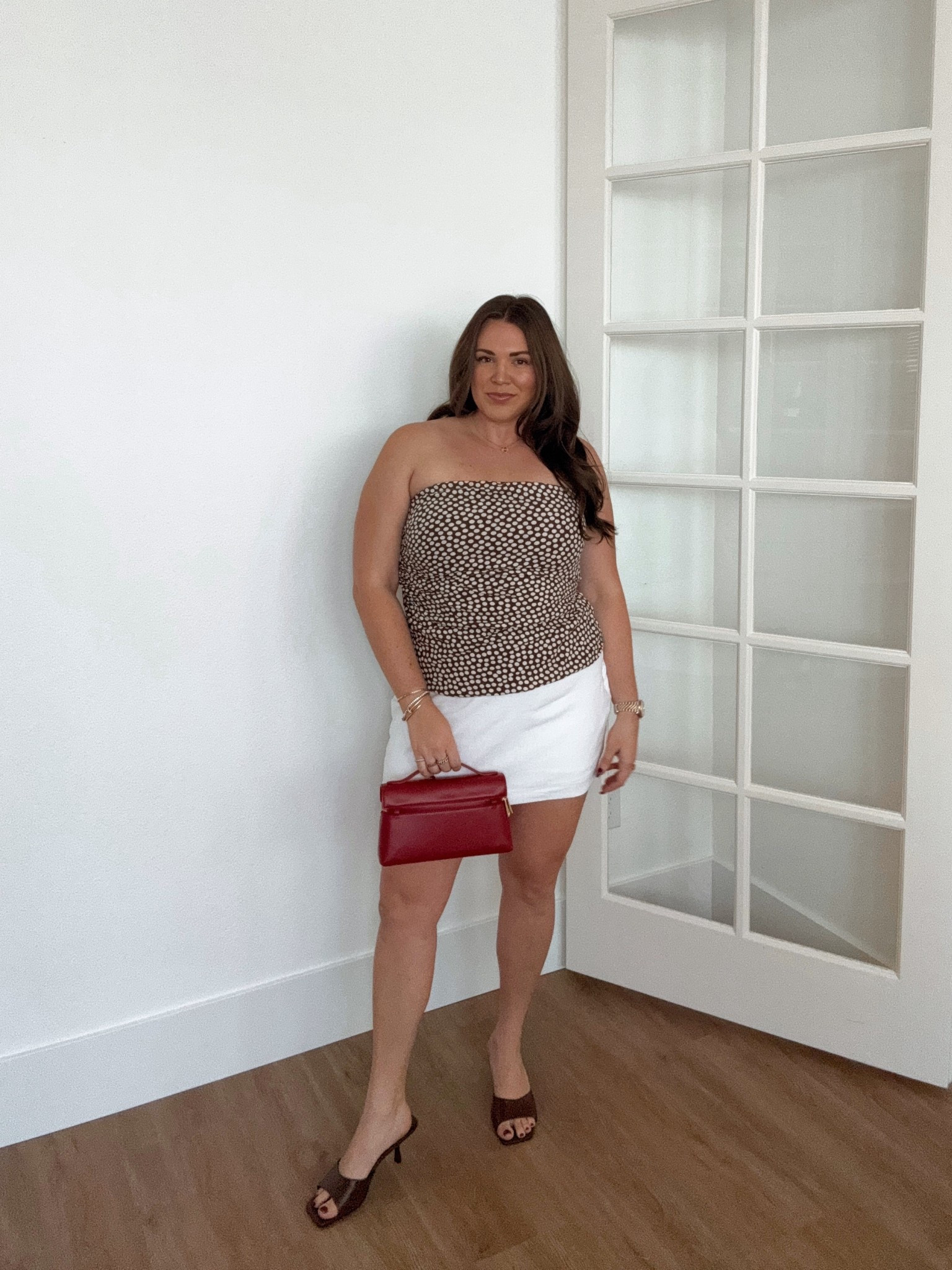 curvy midsize pre-fall outfit! wearing size large in brown dot top and white linen skort 🤎 

#LTKSeasonal #LTKFindsUnder100 #LTKMidsize