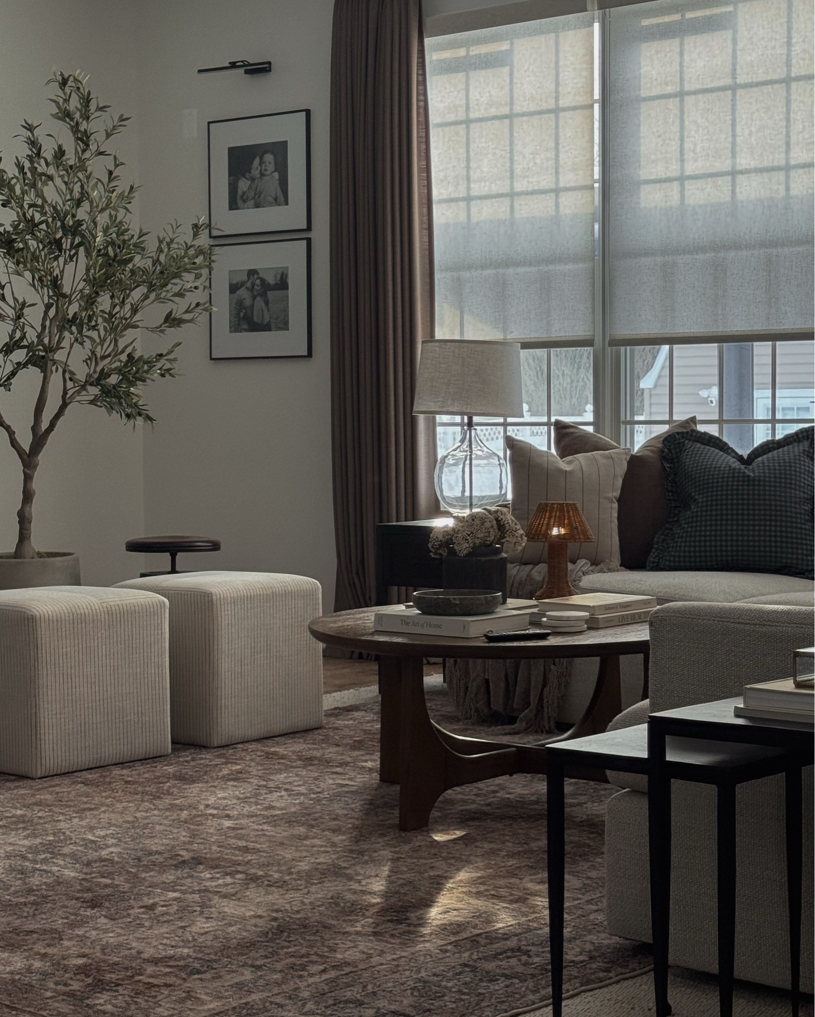 Spring decor, living room decor, woven nook pillow covers, coffee table decor, Yoolax smart blinds, Amazon curtains, olive tree, layered rugs, living room rug, spring throw pillows, table lamp, coffee table books

#LTKHome