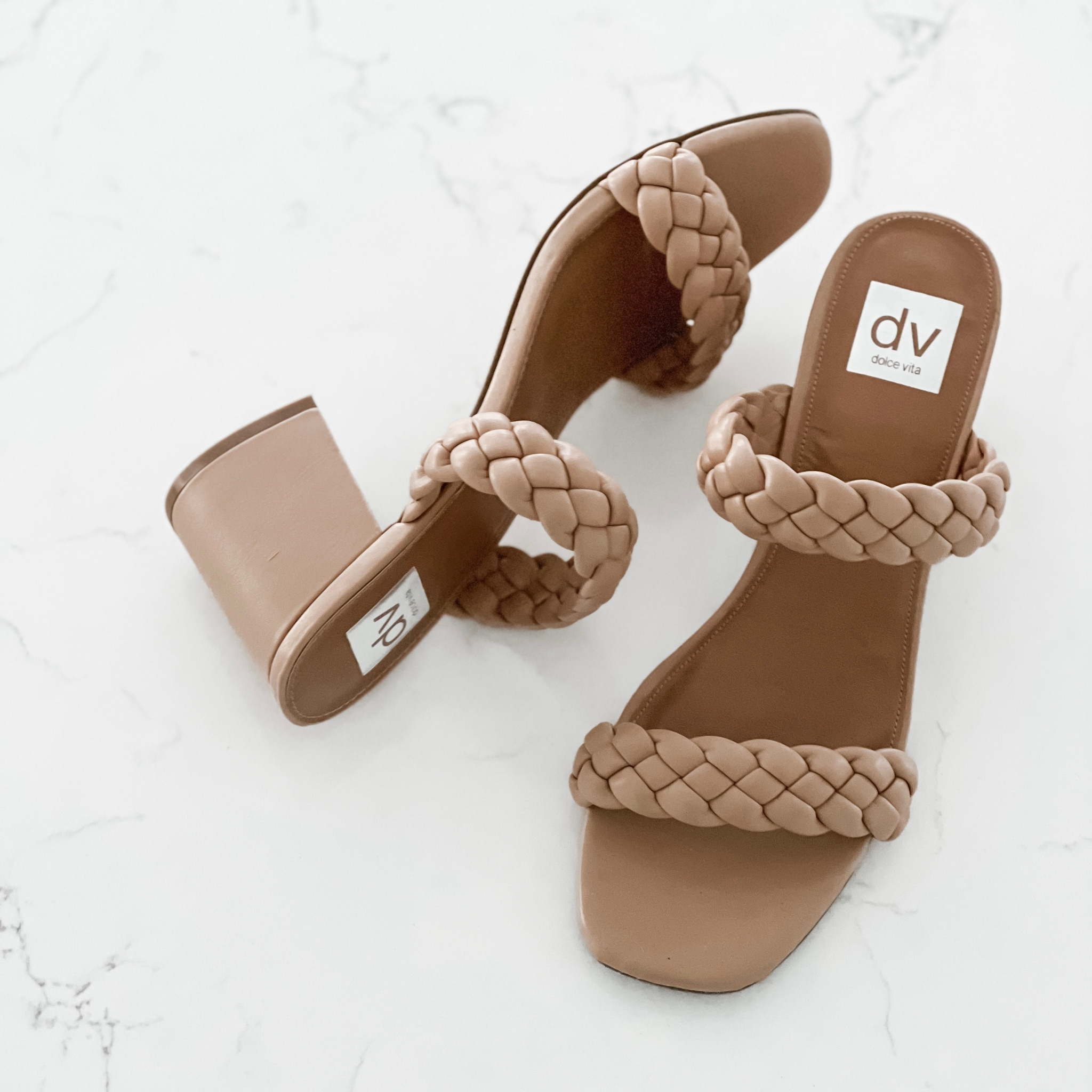 These cute neutral heels are surprisingly comfortable — the heel height is perfect (not too tall, not too short) and the block heel makes it easy to walk in. The braided straps add that little special something while still remaining simple enough not to detract from the rest of your outfit. They’re the perfect pairing for event season dresses!

#LTKshoecrush