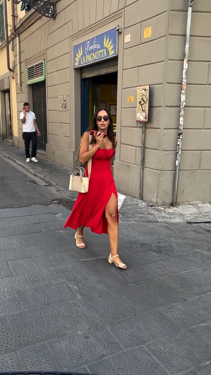 A red dress is more than a dress. It’s a declaration.

📍 Florence, Italy
