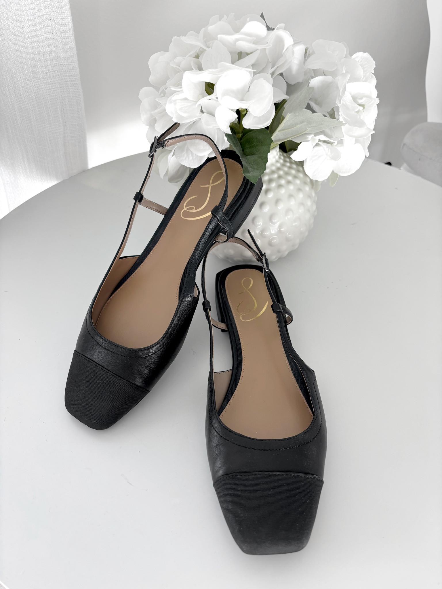 Black sling back Parisian shoes 🖤☕️

Black flat shoes, cute flats, two tone black shoes, like Chanel black shoes , French style shoes, black French shoes, square toe flats black 

#LTKworkwear #LTKshoecrush #LTKstyletip