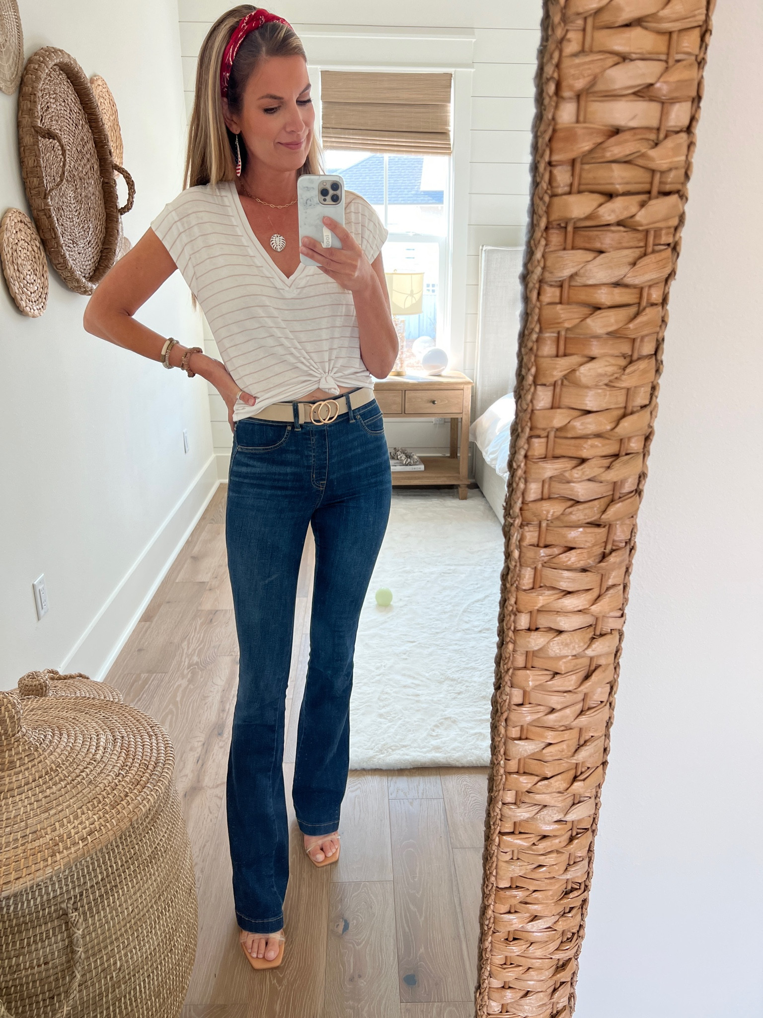 Small tee - perfect for knotting. Amazon belt.  Xs tall flare jeans - use code RACHELXSPANX for a discount.  

#LTKunder50 #LTKshoecrush #LTKsalealert