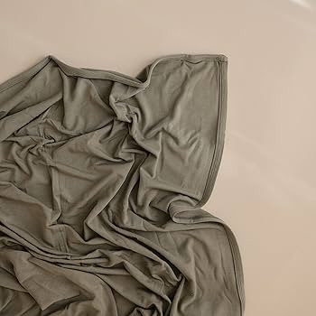 mushie Stretchy Baby Swaddle Blanket | Extra Soft & Snug Fit | 47"x47" (Dried Thyme) | Amazon (US)