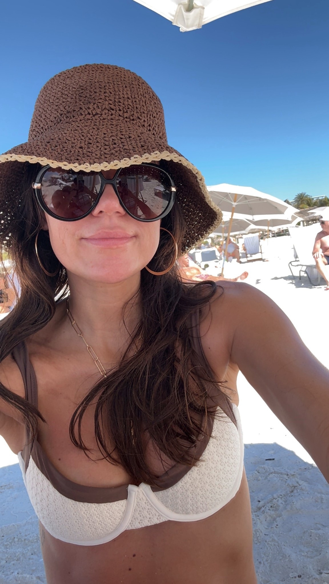 Beach vacation outfit ☀️ brown bucket sun hat from @target @targetfashion and crochet bikini from @abercrombie 

My swimsuit is on sale 20% off with code: AF20 

#LTKSaleAlert #LTKSeasonal #LTKSwim