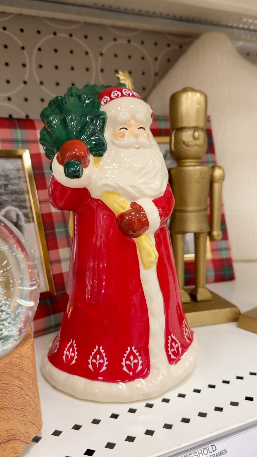 ✨ Loving this little holiday shelf moment ✨ I literally just threw these pieces together in-store to show how easy it is to create a cozy vignette. A mix of plaid, brass, and a few nostalgic touches — Santa, nutcrackers, snow globes, and framed winter scenes — and suddenly you’ve got instant Christmas magic on a tray or shelf or a perfect hostess and Christmas gift!! . ❤️🎄

Christmas Decor
Holiday Decor 
Holiday styling 
Holiday home
Target Finds

#LTKSeasonal #LTKGiftGuide #LTKHoliday