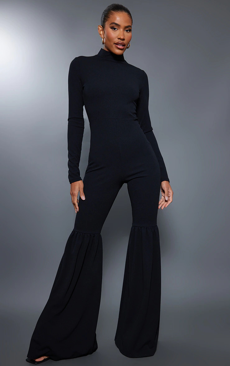 Black High Neck Extreme Flare Long Sleeve Jumpsuit | PrettyLittleThing US