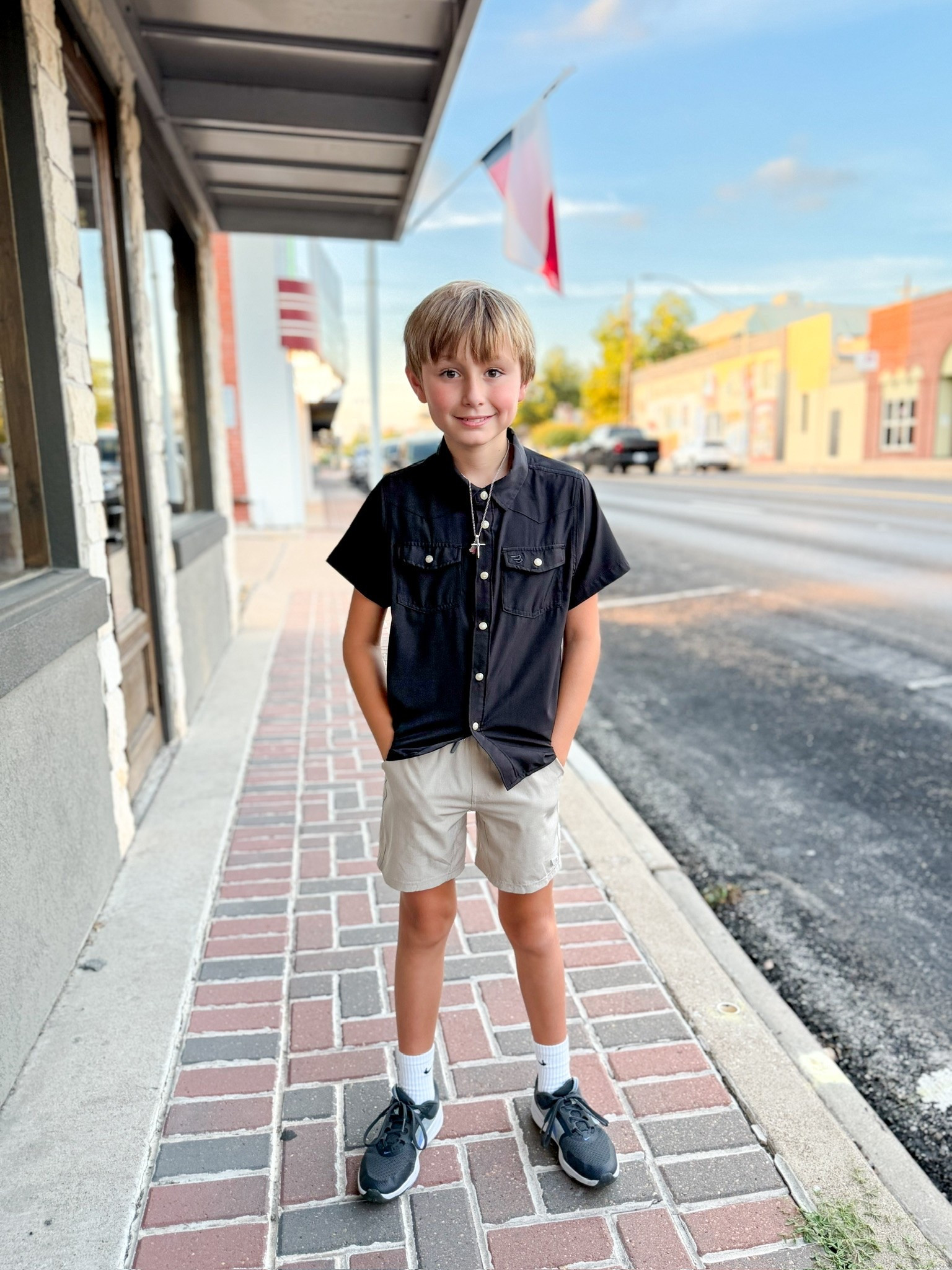 Kevin looking sharp in his @BURLEBO  -  the buttons really pop on this black shirt.  Looks so good paired with khaki.

//
Boys shirts
Boys button up shirts 
Boys burlebo

#LTKmomlife #LTKKids #LTKMens