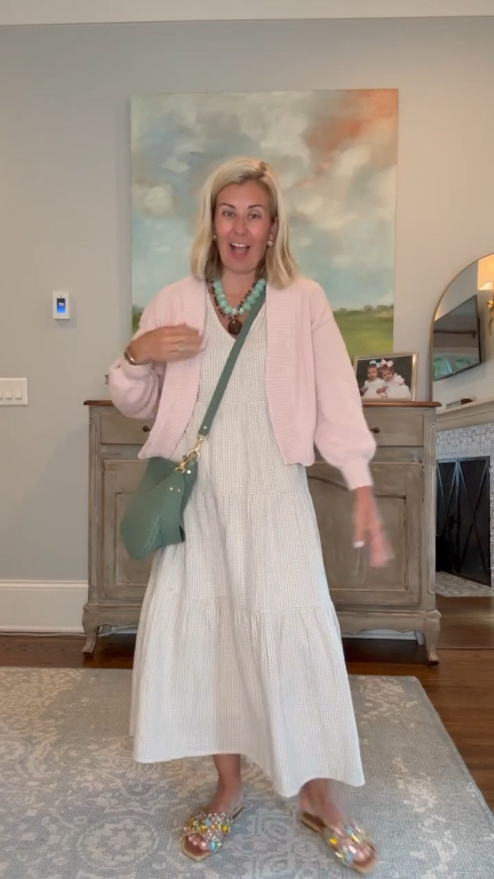 Oh wow I love this dress! It’s the perfect throw on and go dress. I’m in xs dress & cardigan and 7 bling sandal (size 1 down).

#LTKootd #LTKmomlife #LTKOver40