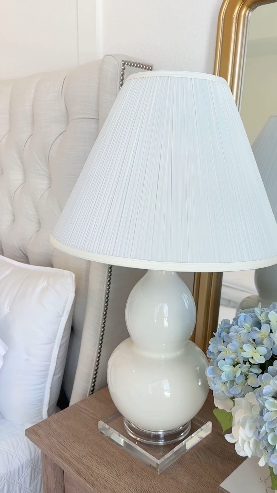 Refresh  your lamps with a pleated lamp shade and lucite riser  