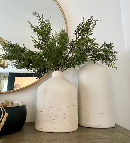 Christmas decor, holiday pine, pine branches, pine stems, cream vases, greenery

#LTKHoliday #LTKhome