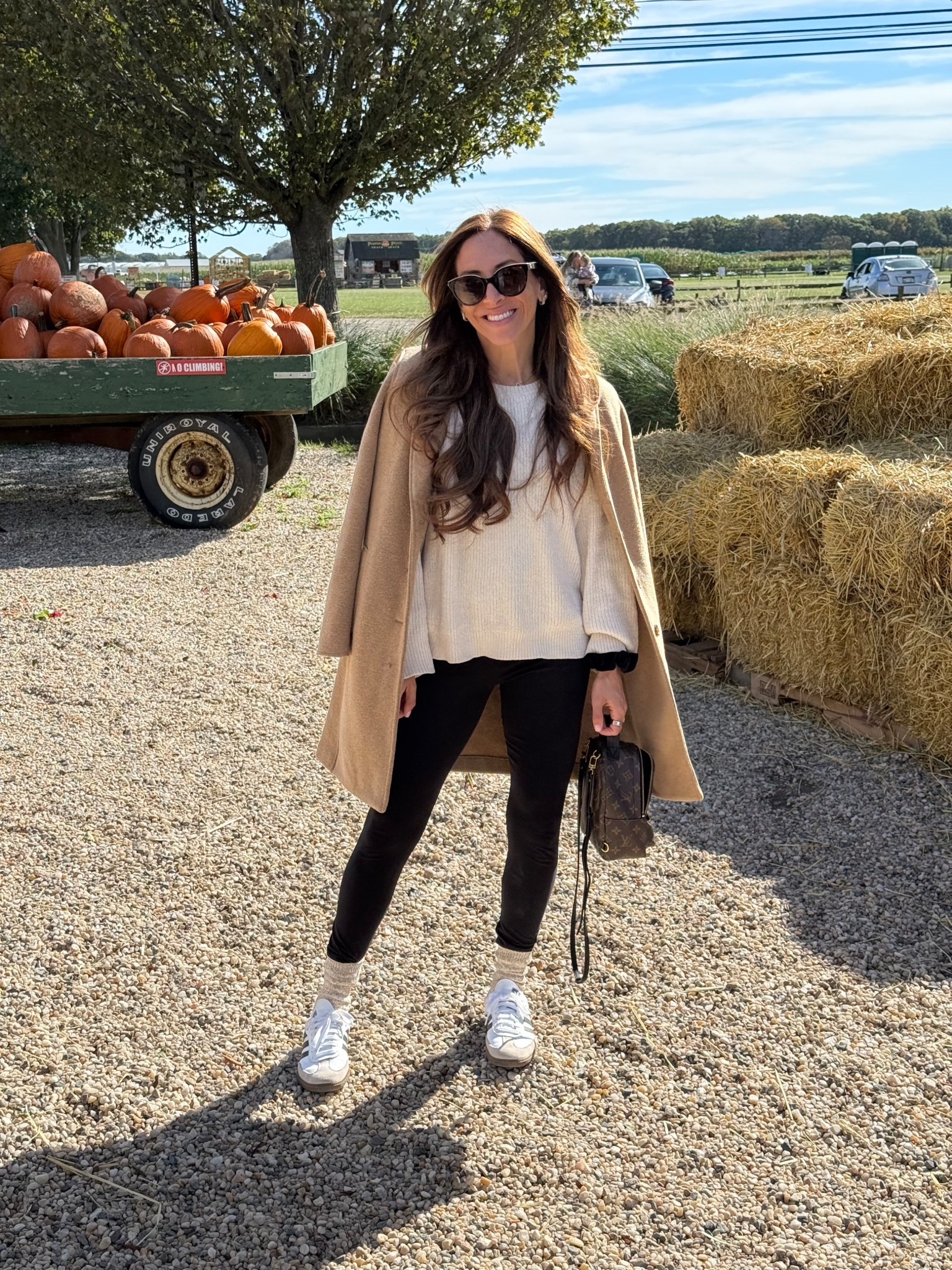 Here is my “tired suburban mom in a pumpkin patch” fit 🤣 I kept it super cozy, and I have zero regrets about it! Comfy cream colored sweater, black leggings, knit crew socks, OG sambas, a wool blend pea coat, and my Palm Springs mini backpack  

#LTKFindsUnder100 #LTKStyleTip #LTKSeasonal