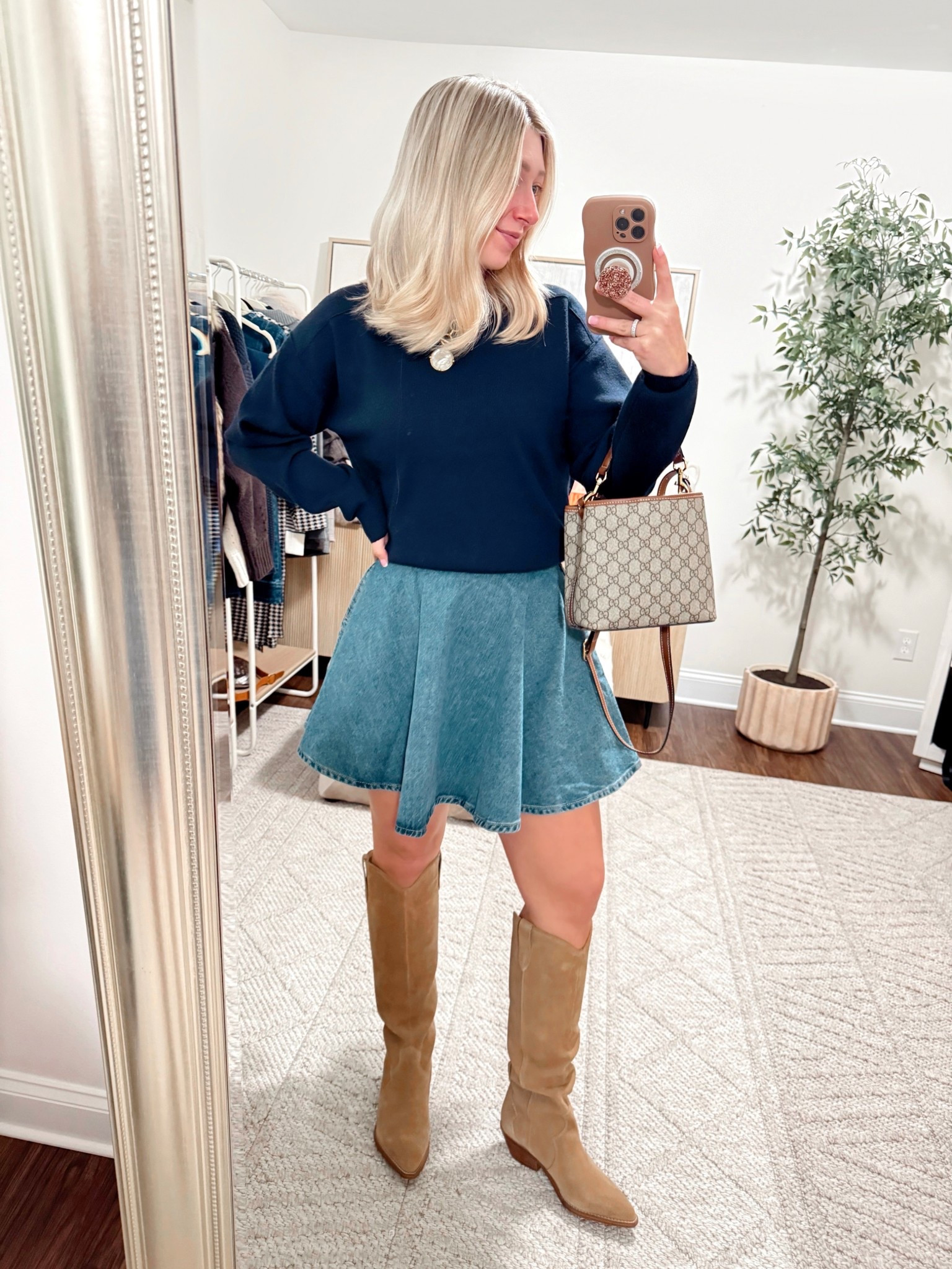 Possible Thanksgiving outfit 🦃🫶🏻This denim skirt is on major sale and is a perfect staple for year round! It runs small, wearing size medium (size 4 for reference)! 💁🏼‍♀️ Sharing everything in stories and you can shop it via the 🔗 in my bio!

Size small sweater, size up 1/2 size in boots! Skirt size medium, size up one!

Thanksgiving outfits, denim skirts, sweaters, Gucci bags, boots 

#LTKHoliday #LTKPetite #LTKCyberWeek
