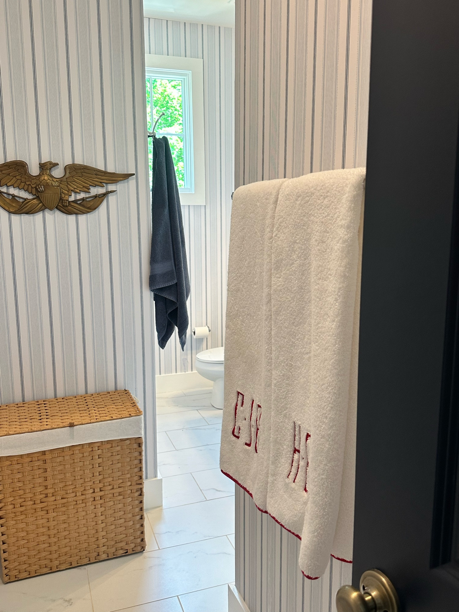 Red White & Blue little boys bathroom. This blue striped wallpaper is also on sale right now! 

#LTKSaleAlert #LTKHome