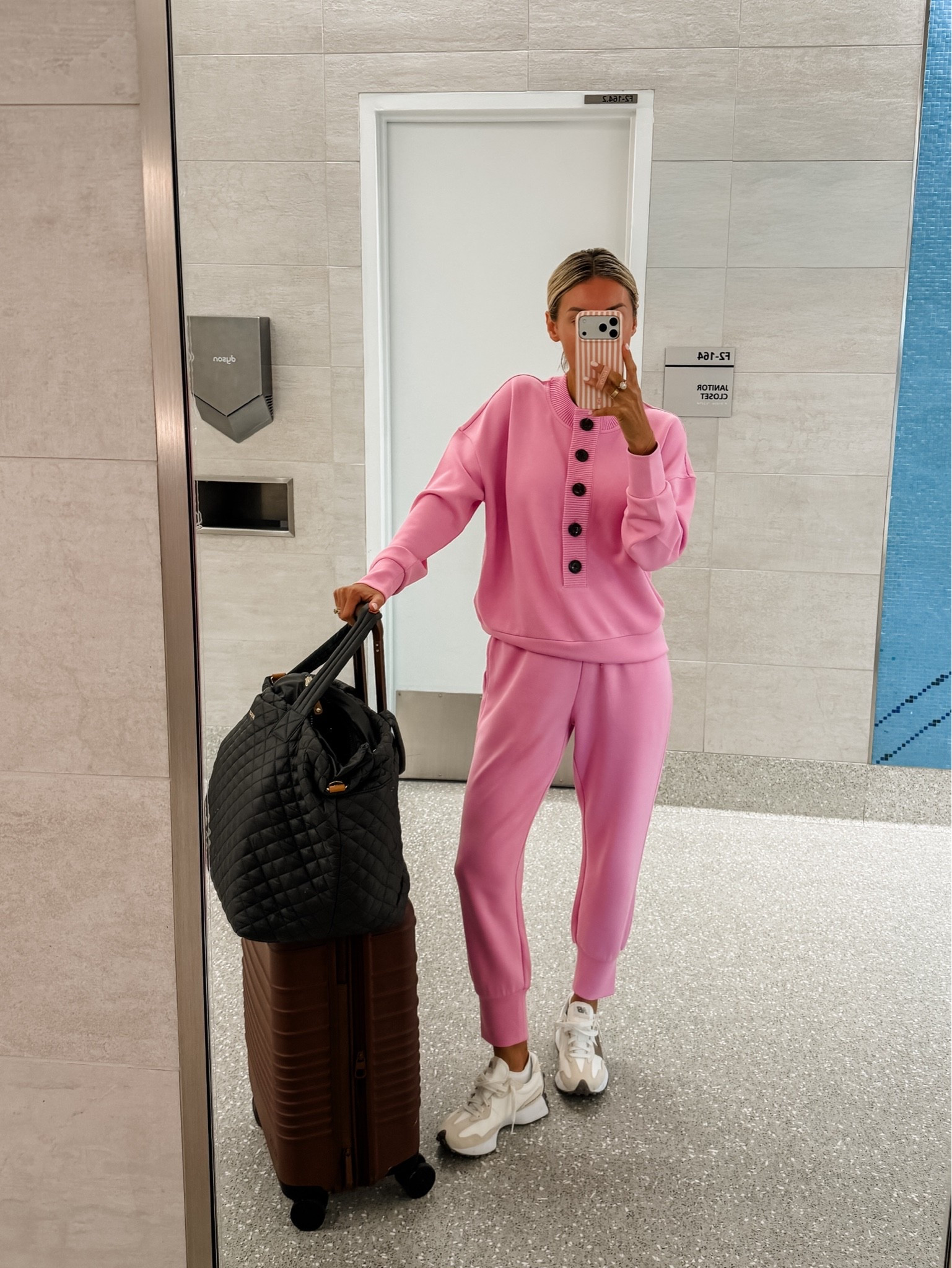 My outfit on the way home from New York! I love this bright pink! Wearing S!

Loverly Grey, travel outfit, airport outfit, New York, luggage, carry on, Beis 

#LTKTravel