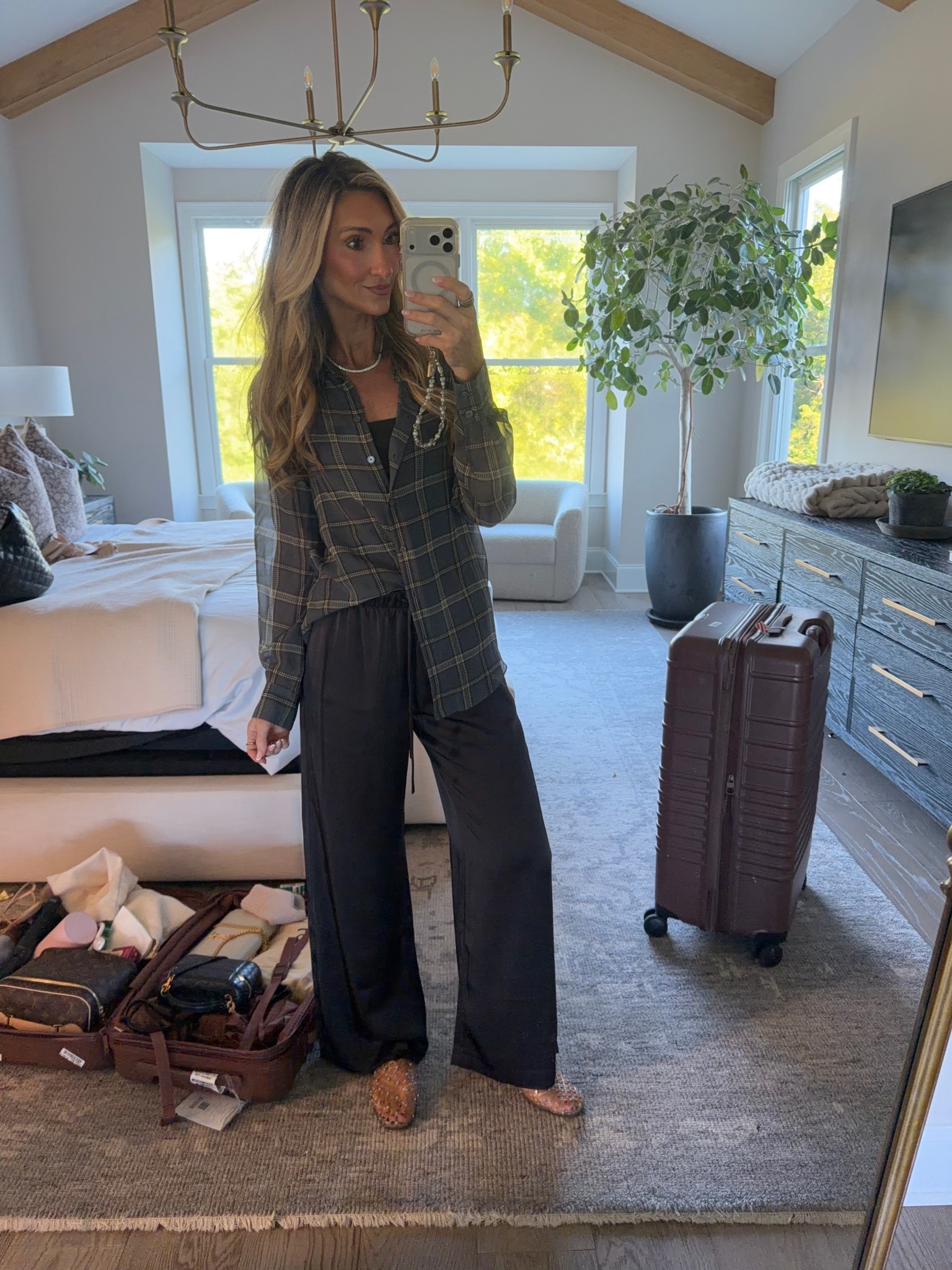 What I’m wearing to the airport today! Our favorite pants now come in this satin option! So gorgeous and comfy! Fall outfit, travel style

#LTKdayinmylife #LTKgrwm #LTKootd
