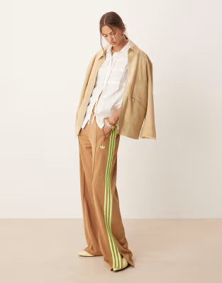 adidas Originals Firebird Loose track pants in beige and lime | ASOS (Global)