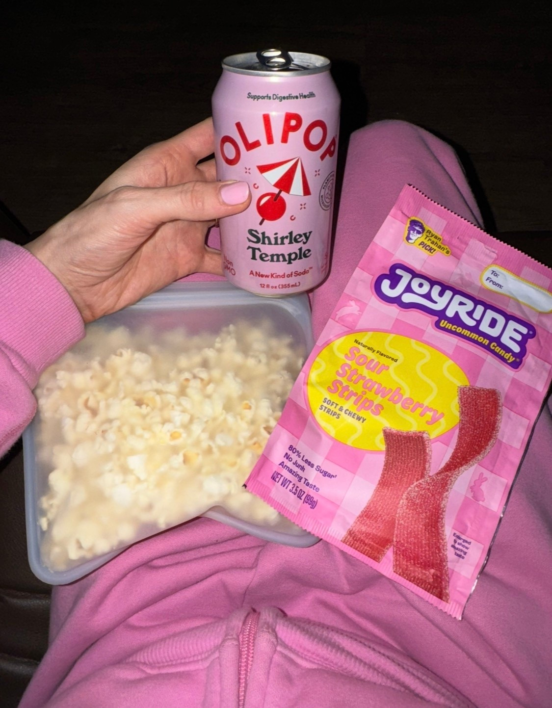  Movie snacks with an intentional twist. I love Lesser Evil popcorn made with coconut oil for a cleaner fat source and that perfect crunch, paired with Joyridr sweets better-for-you candy and Olipop for a soda alternative with less sugar and added gut-friendly benefits.
Fit: Nothing beats a Skims soft fleece cozy set and this color is so girly💕 Size medium for an oversized fit!

#LTKootd #LTKfoodie #LTKmomlife