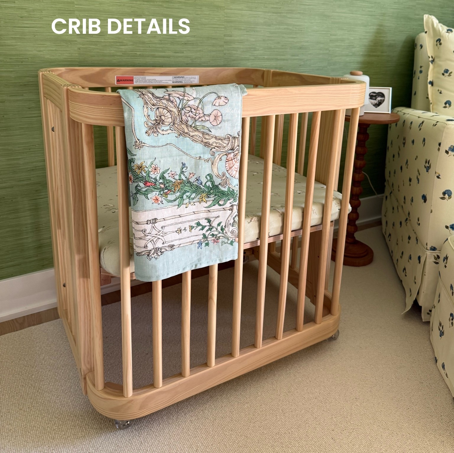 [9/23/26] crib is the wave crib from nestig in natural wood - converts from a mini crib, to full crib, and then toddler bed which I love since it can grow with your baby! The natural wood color is so beautiful. Carré and bib set is from Atelier Choux and a sweet gift from the LTK team 💓 this is called the original. Unfortunately both are not linkable, so sharing similar styles and nursery details below 🦒✨🤍

• Nursery glider is from Nestig (The Drift Glider Recliner Nestig x Zoë Feldman) in blue mini meadow, unfortunately not linkable! We have another nursery glider in our master bedroom from @oilostudio, linking that as well 
• Crib is from Nestig as well (The wave crib in natural wood) linking similar options!  
• Bookshelf behind glider is 36” floating wood shelf from Target in natural wood colorway 
• Roman shades are from Pepper home - Margot Fern without tassel trim included 
• Carpet is custom from Home Depot linking exact
• Drawer and changing table is from pottery barn (Fillmore 8-Drawer Changing Table in seadrift and natural cane) paired with Keekaroo Peanut changer 
• Floor lamp is a few seasons ago from Anthropologie, linking similar! 
• Flushmount lamp came with the house, but found the same (if not very similar!) on crate and barrel kids

#LTKHome #LTKBaby #LTKmomlife
