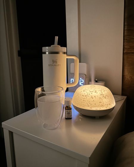 What’s on my bedside table 🤍 Stanley 30oz filled with ice water, my magnesium I drink every night & my oil diffuser with “calm”. Linked everything 🥰🥰

Nighttime routine, evening routine, magnesium, Amazon find, Stanley tumbler 

#LTKunder50 #LTKhome
