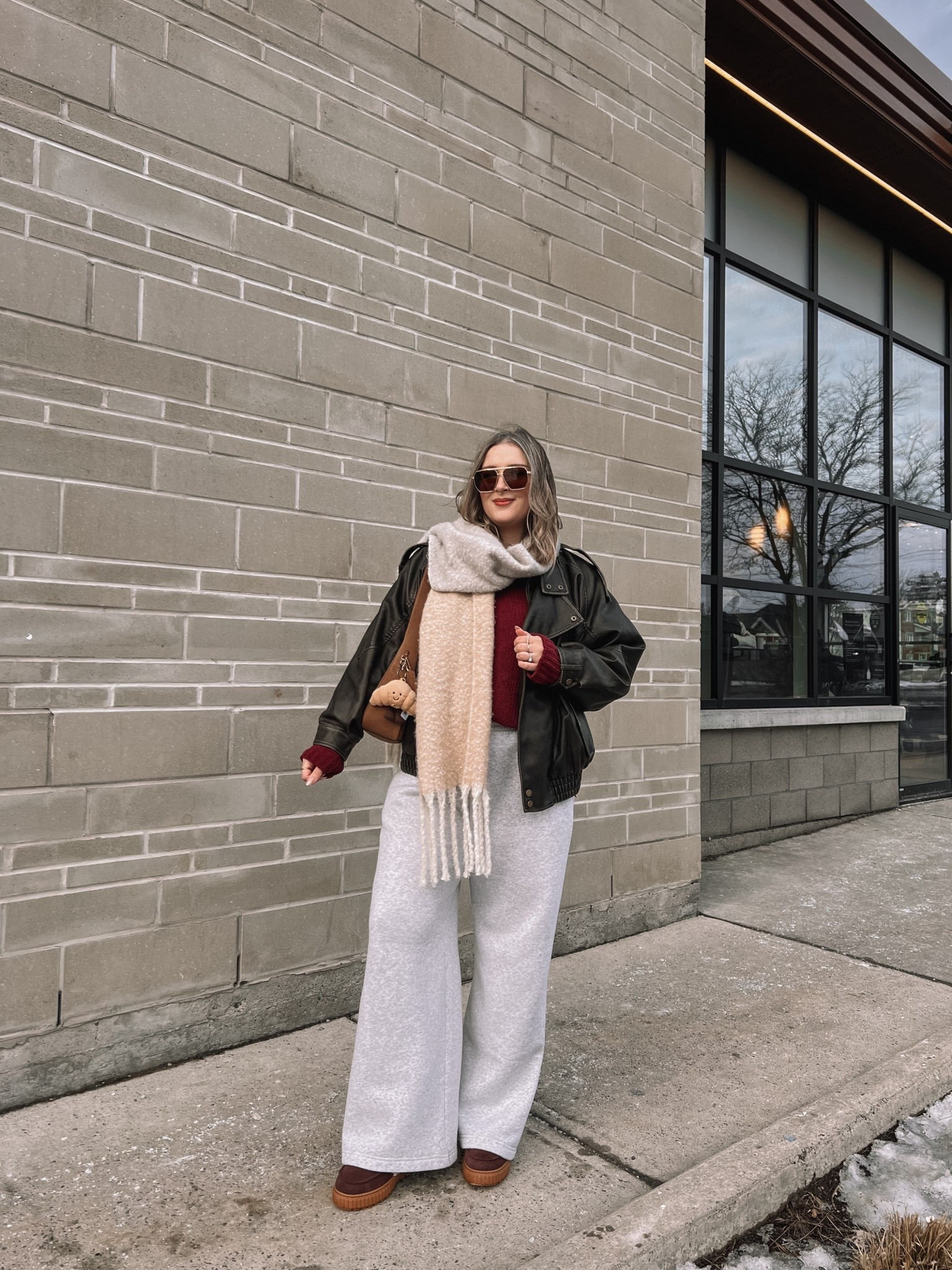 Comfy casual winter outfit! Wearing my usual size L in the wide leg sweatpants, burgundy chenille sweater, white tee, and oversized leather jacket. Sorel snow boots are waterproof and so cozy, consider sizing up if you plan to wear thick socks. Linked similar scarves


#LTKwinter #LTKmidsize #LTKstyletip