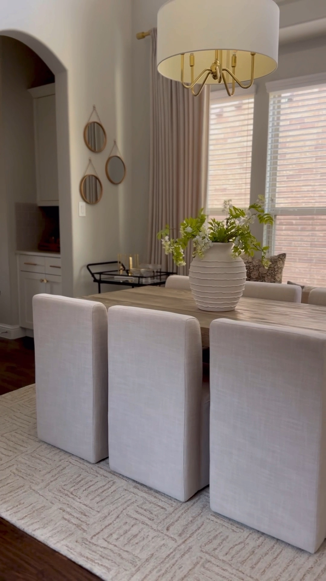 Giving our dining room a spring refresh! 🌿

I love how our new @loloirugs beauty blends our dark wood floors with our light wood table so perfectly. (Currently on sale!) And I found the prettiest vase at @homegoods and used the same florals on both the dining table and accent table to keep everything feeling cohesive. Love how fresh and inviting this space feels for the season!

#LTKSaleAlert #LTKHome