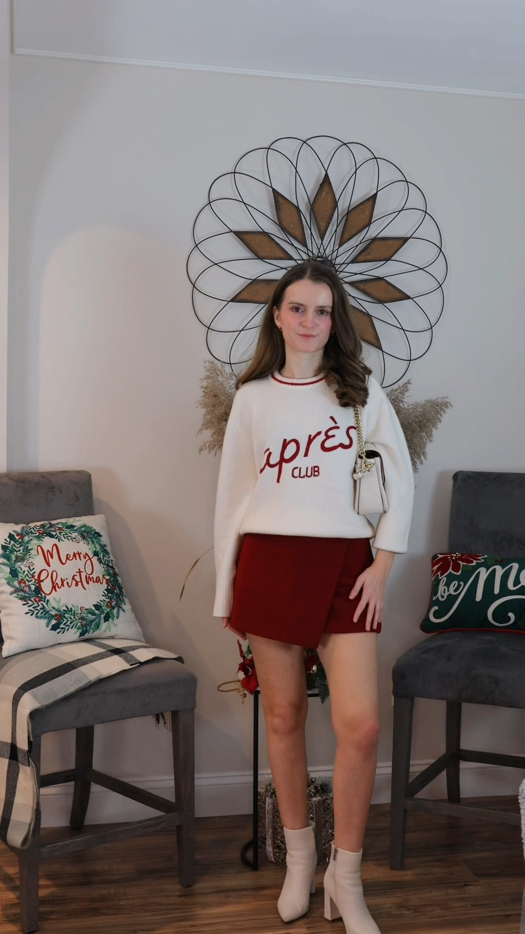 This après knit sweater paired with a red mini skirt, white booties, and a white shoulder bag is the ultimate cozy-chic look. Perfect for holiday gatherings, winter brunches, or a festive night out!
.
.
.
.
.
Holiday outfits | holiday party outfit | holiday sweater | holiday looks |sweater and skirt outfit | sweater and boots | festive sweater | holiday sweater | knit sweater | skirt outfits | mini skirt fall | holiday skirt outfit | holiday party skirt | red skirt | ankle booties | fall booties | fall outfits | winter outfits 

#LTKCyberWeek
#LTKSeasonal #LTKHoliday #LTKU #LTKSaleAlert #LTKGiftGuide #LTKWorkwear #LTKTravel #LTKShoeCrush #LTKItBag #LTKParties 

#LTKStyleTip #LTKFindsUnder100 #LTKFindsUnder50