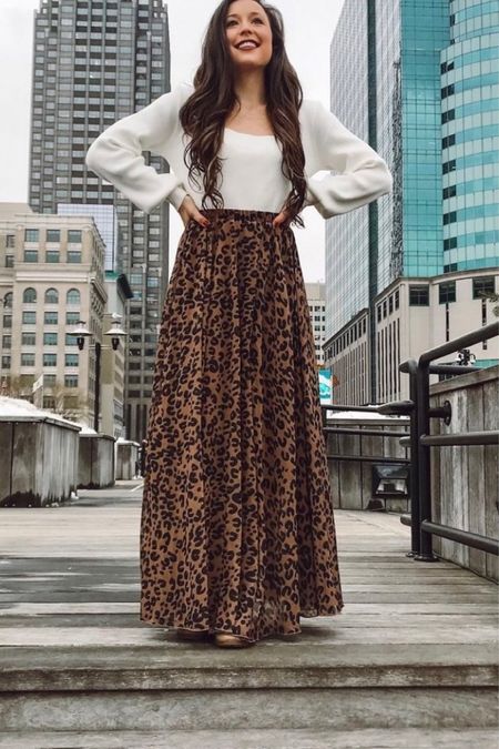 Must have winter outfit featuring a leopard maxi skirt and square neckline sweater 

Skirt on sale

#LTKsalealert #LTKHoliday #LTKSeasonal