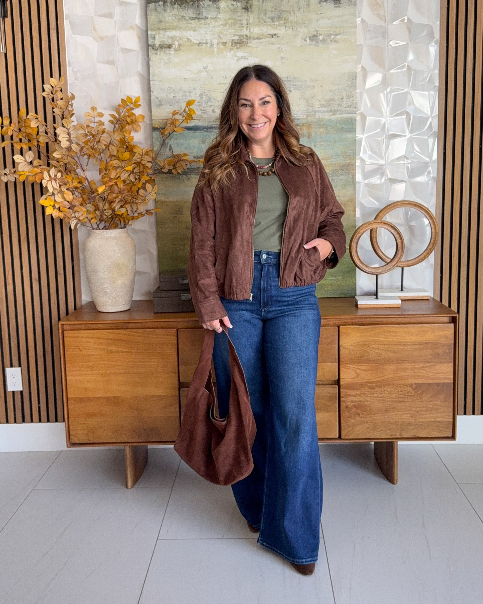 Fall layers done right 🤎 @oldnavy Brown suede bomber jacket over an olive green tee, paired with dark wash wide-leg flare jeans rom Paige and a brown suede hobo bag. An easy, elevated casual look in rich fall tones.

Sizing: Jeans tts, 31 | Tee and jacket in large

#LTKSeasonal #LTKOver40 #LTKMidsize