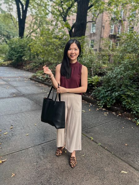 September work outfit, transitional work outfit, Amazon fashion: burgundy sleeveless top, burgundy mock neck top, sleeveless work top, high waisted work pants, khaki wide leg pants with elastic waistband (M), black tote bag with zipper, leopard loafer mules (TTS).

#LTKSeasonal #LTKunder50 #LTKworkwear