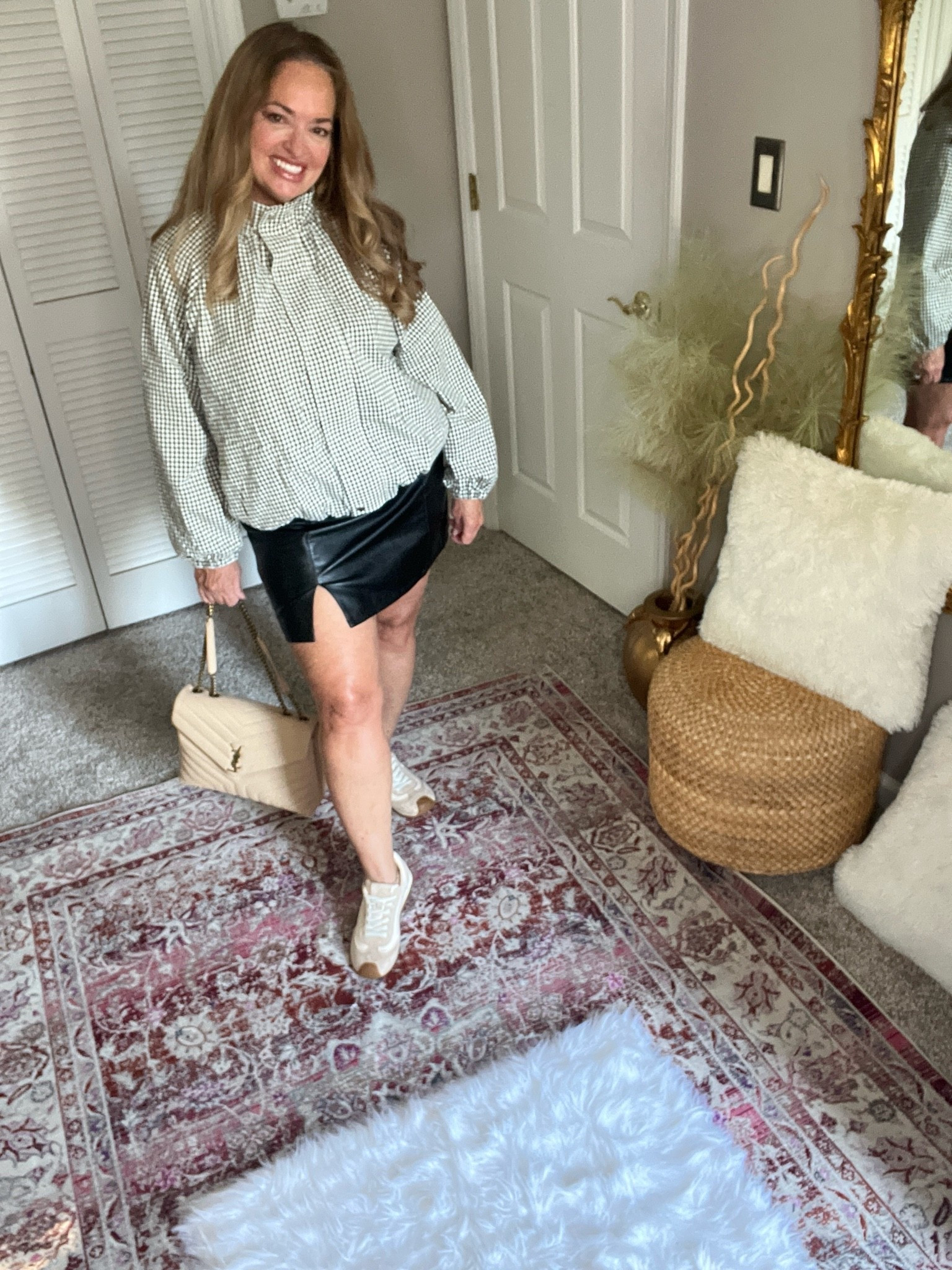 Fall
Look. Houndstooth funnel neck jacket with leather skirt.

#LTKgrwm #LTKOver40