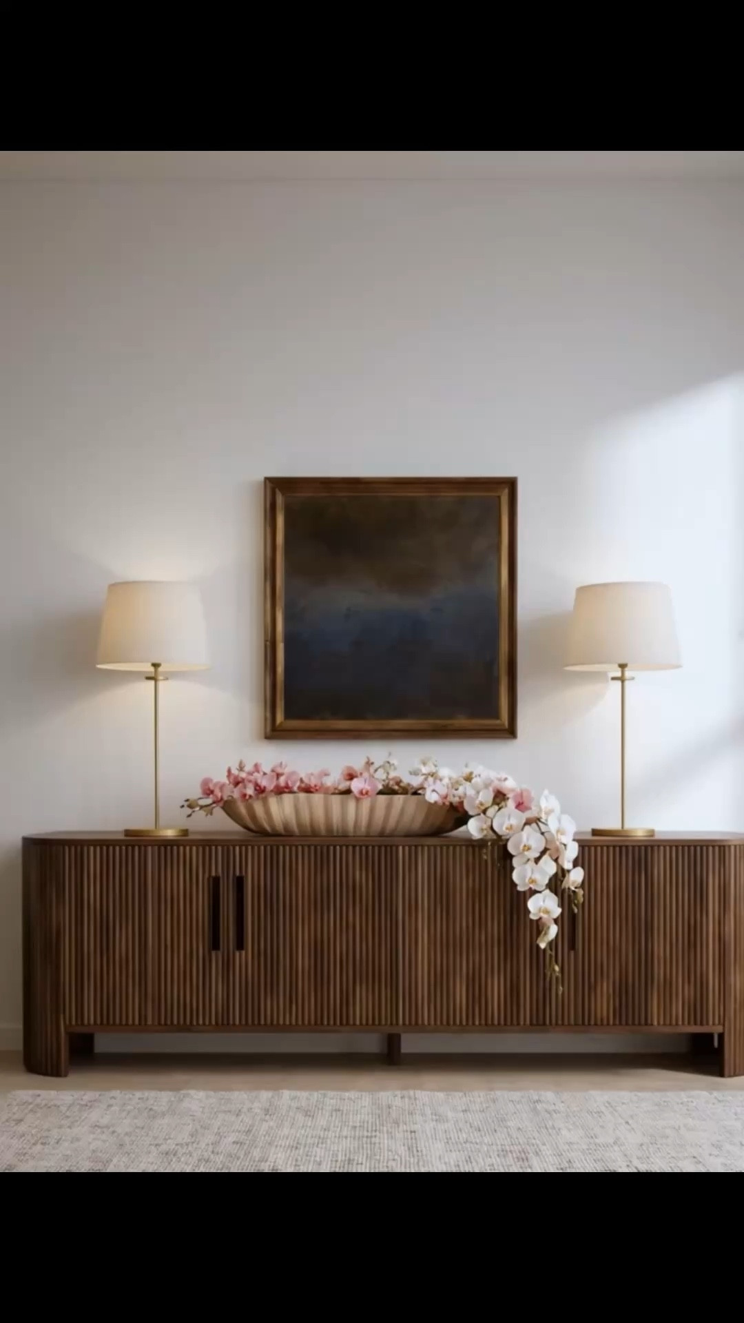 Springtime entry refresh 🌿 one piece I always recommend splurging on is a beautiful media console—whether by the entry or in the living room. It anchors the space and sets the tone the moment someone walks in.

Especially this piece by Arhaus, I love the reeded detailing, the marble top, soft self-closing doors, and the generous storage that keeps everything tucked away but elevated.

Right now it’s up to 50% off at Arhaus—such a good time to invest in something you’ll style around for years.

#mediaconsole #sideboard #entryway #entrydecor #livingroomdecor #cabinet #consoletable #tablelamp #wallart #rug #floralarrangement #orchid #homedecor #interiordesign #springdecor #springhome #homeinspo

#LTKHome #LTKSaleAlert