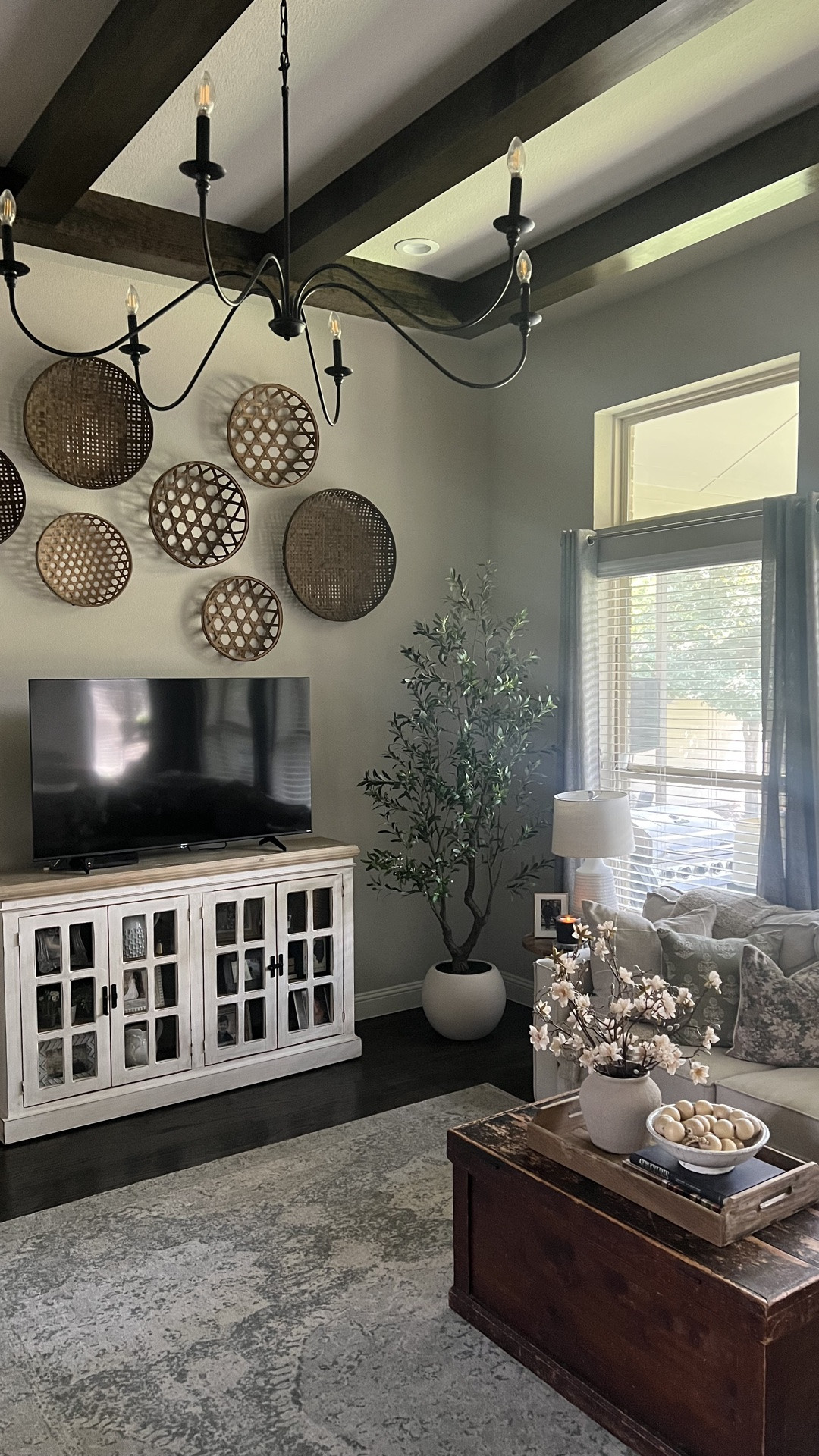 I did a little living room summer refresh, changed out a few throw pillows, got a new faux olive tree and some faux flowers and it feels airy and light now. You don’t have to spend a lot to make a difference! 

#chiconashoestringdecorating

#LTKSeasonal #LTKHome