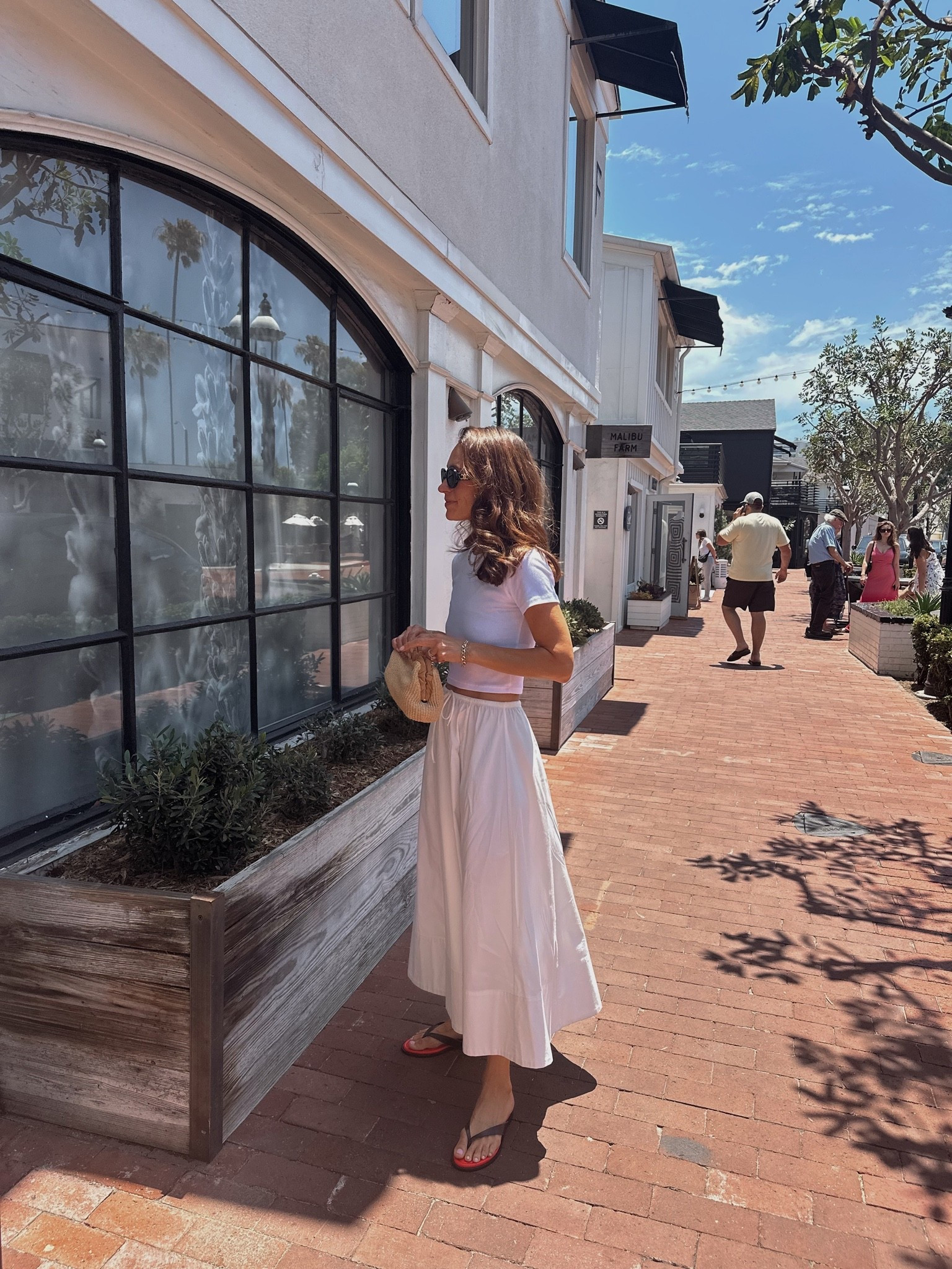 Today’s summer outfit in summer essentials 
cotton poplin skirt in petite which is short gal friendly 
White tee 
Go down a 1/2 size in the sandals

#LTKOver40