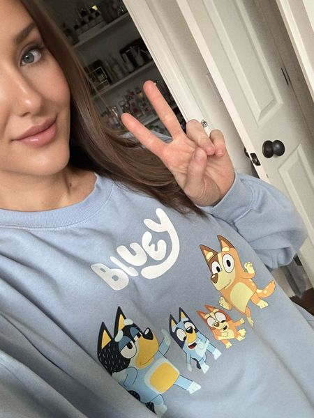 Bluey!! 🎈 twinning with my daughter today. But this has become one of my favs- so soft and comfy. This one is only available in 1x which is the size I got for a perfectly oversized loungey look. I’ll link another cute sweatshirt and the top I got my daughter. 

#LTKxTarget #LTKfamily