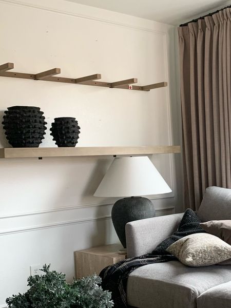 Raising bottom shelf but totally love them 

Shelfie 
Shelf styling 

#LTKfindsunder50 #LTKhome #LTKfindsunder100