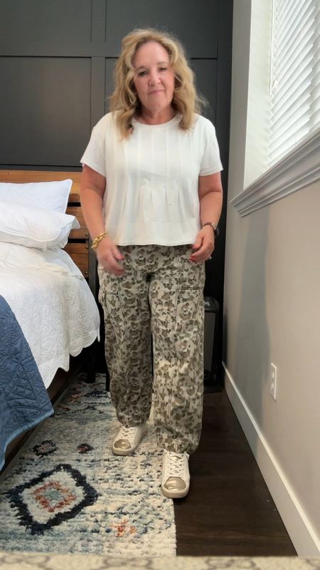 New cotton tee by Anthro. It’s super soft and comfy. Wearing a large. 

Pants are a barrel utility jean. Definitely went out on a limb on these. I’ll link similar. They’re not online yet. 

Anthropologie anthro style barrel leg jeans camo utility pants 

#LTKover40 #LTKmidsize #LTKSeasonal