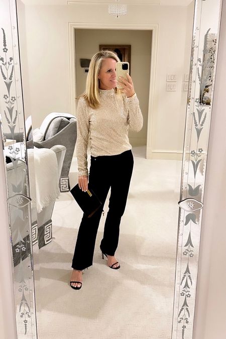 Obsessed with this champagne sequin long sleeved top
Most flattering black jeans 
Black sandals 
Black clutch 
Holiday party look 
Casual holiday style
What to wear New Year’s Eve 

#LTKstyletip #LTKover40 #LTKHoliday