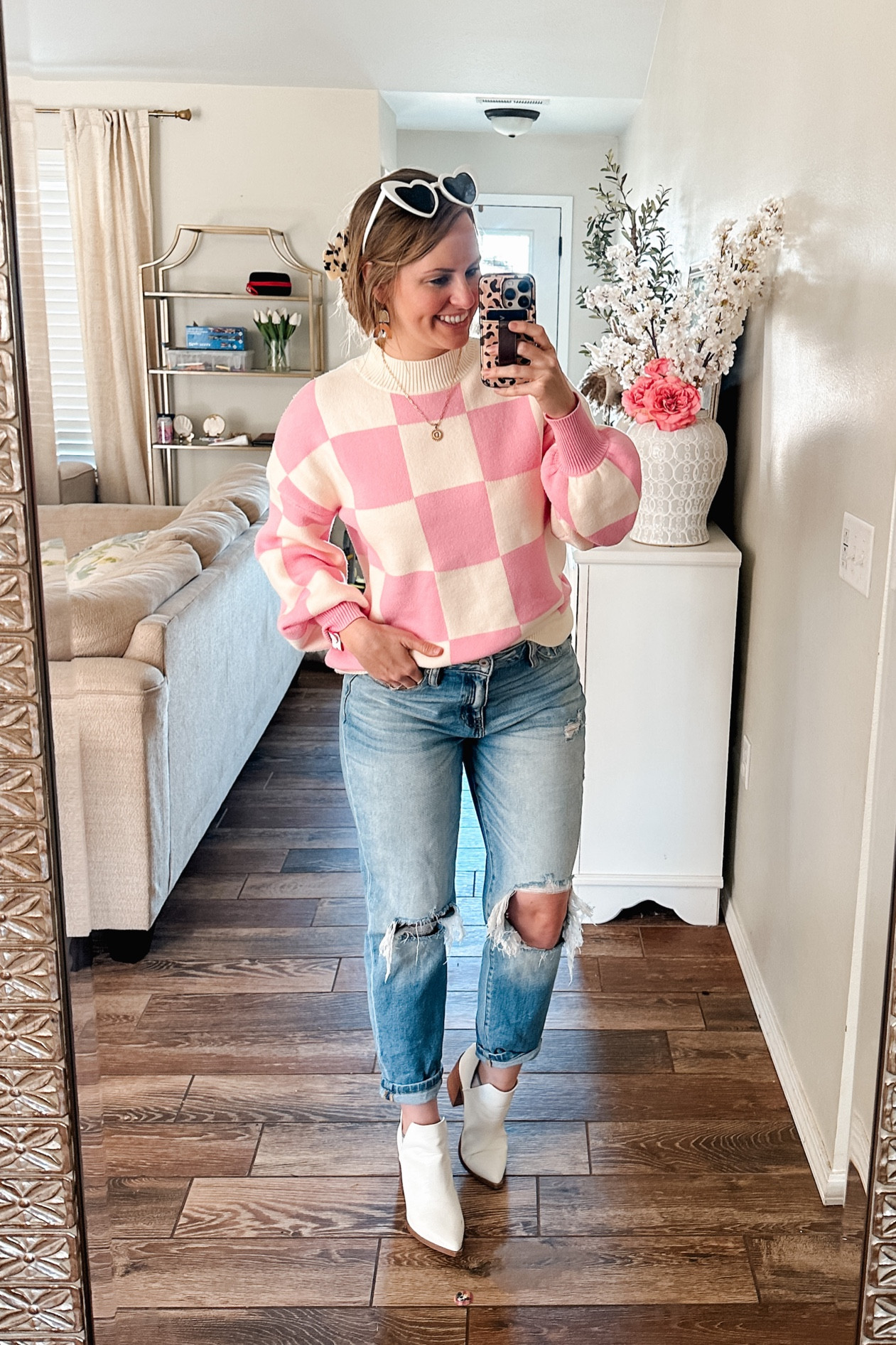 Valentine’s Day outfit. Amazon fashion finds: spring outfit perfect for valentines, date night or Galentines event! Hair Claw clip from amazon. 

Love this pink and white checkered sweater, high waisted mom jeans and white ankle boots! Threw on some heart shaped sunglasses because why not?! 💝  

Casual outfit, mom style, light wash straight leg mom jeans, mock neck sweater, spring outfit, spring style 2023. Amazon sweater. Amazon boots. White Snake skin booties. Tortoise hair clip, gold initial necklace. 

#LTKstyletip #LTKunder50 #LTKSeasonal