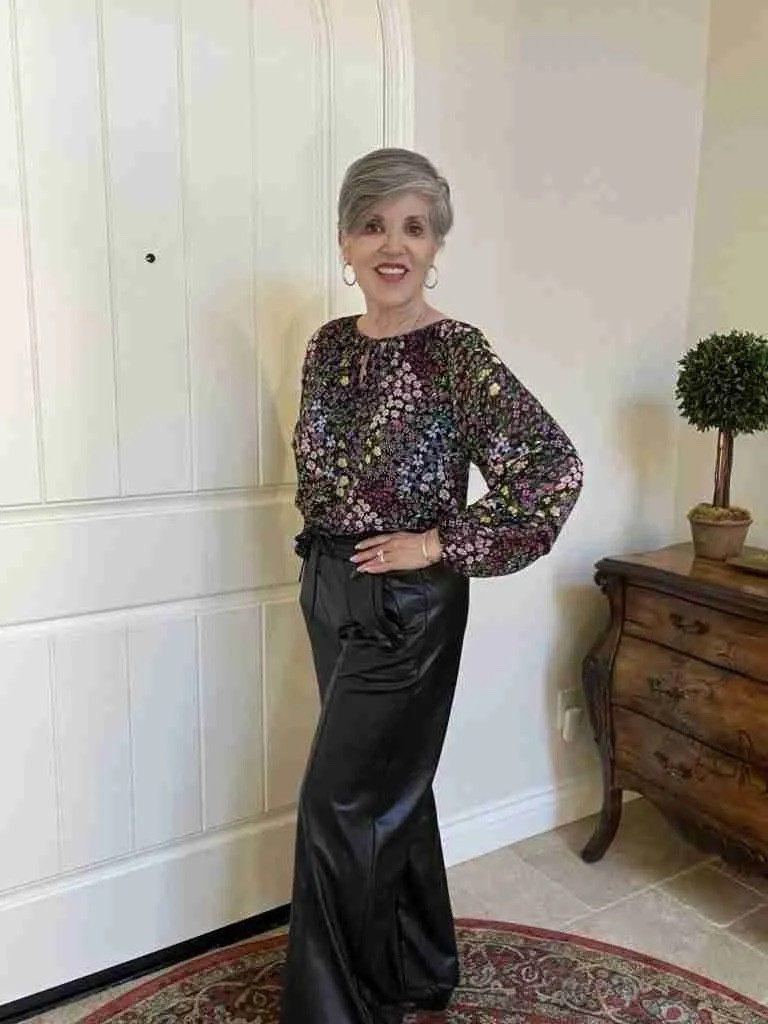 A great winter work outfit or a look for going out with friends is a pair of faux leather pants and a dark floral @evereve top.  I’ve linked several pairs of pants as the sizes are low (but so are the prices!) And I’ve listed a gorgeous top. Add silver pave hoops and black booties to be on your way in style!
#ltkover50
#ltkwinter
#ltkworkwear
#ltkcassicstyle
#ltkunder50

#LTKSpringSale #LTKSeasonal #LTKMostLoved