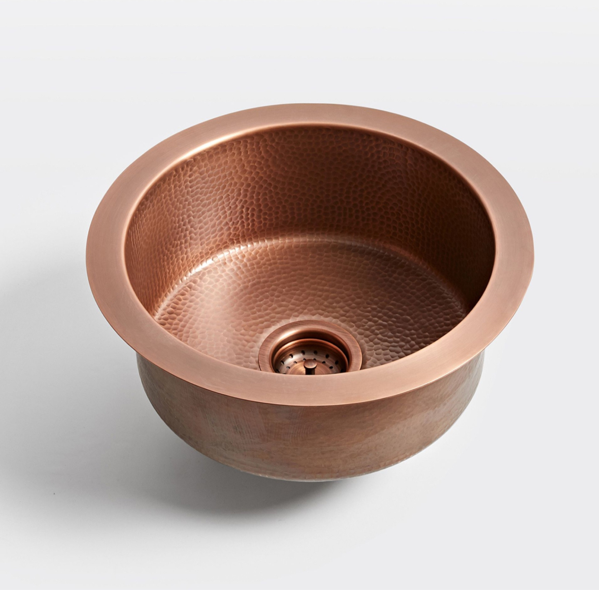 Perfect for a prep area or bar space, the De La Cruz Prep sink boasts a clean spherical shape and hand-hammered copper or stainless steel with seamless construction.

DETAILS YOU'LL APPRECIATE
Hand-hammered stainless steel or copper
Convenient prep sink proportions
Unique shape
Includes coordinating drain
PRODUCT SPECIFICATIONS
Hand-hammered 18 gauge stainless steel or copper
Easy to clean and maintain
Stainless steel will not patina or change over time. We recommend using a high quality carnauba wax (with no polishing agent) to protect the finish
Unfinished copper finish will patina over time. To protect and slow the patina, use a high quality carnauba wax (with no polishing agent)
Sound dampening panels and coating to reduce noise
Ships direct from vendor; non-returnable
Imported

#LTKHome