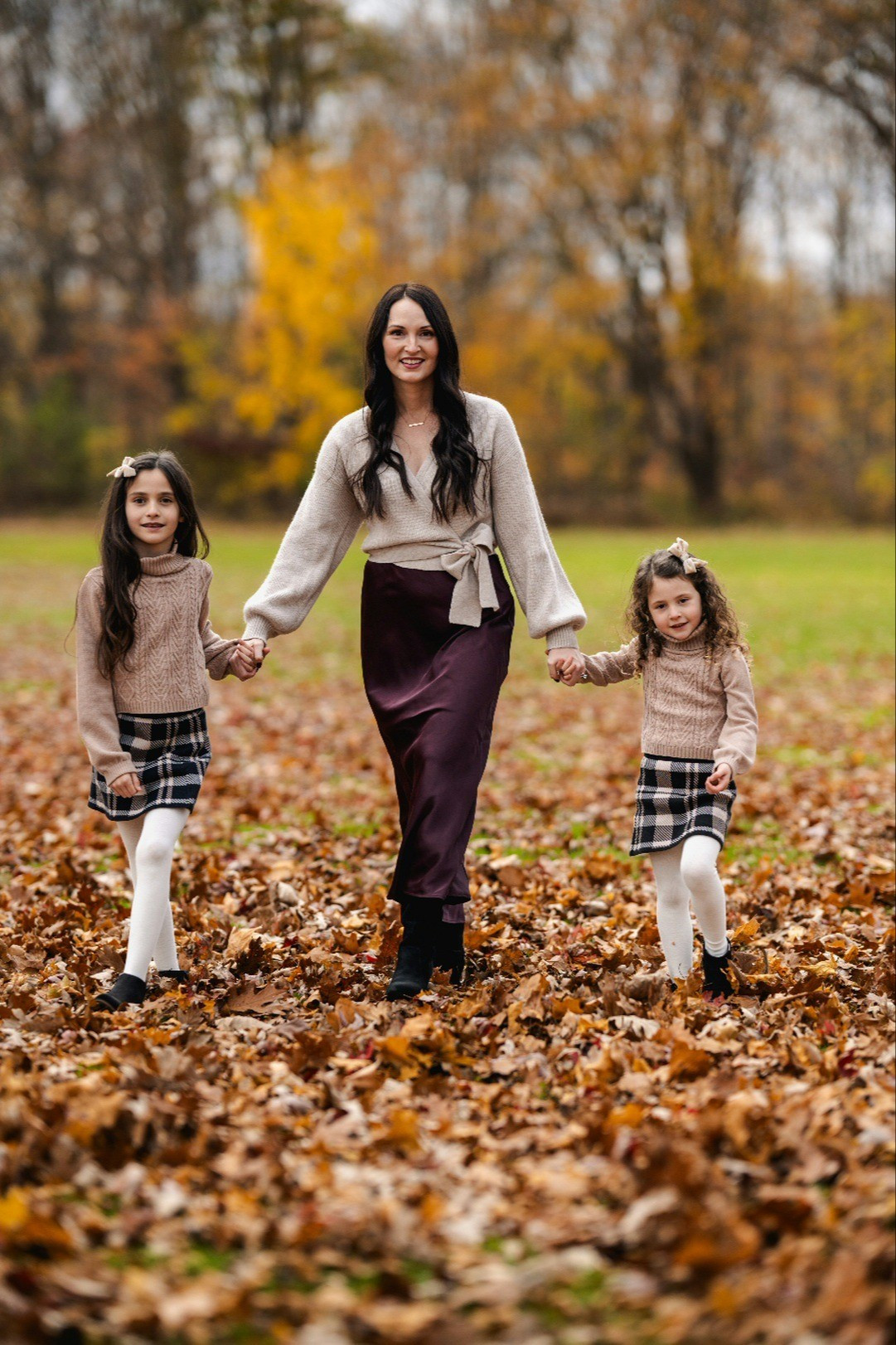 Holiday Family photo outfit inspo - I paired the perfect long satin skirt and wrap sweater with tall boots for our family Christmas photos, but this outfit works as a holiday party outfit or as separates!

#LTKHoliday #LTKFamily #LTKStyleTip